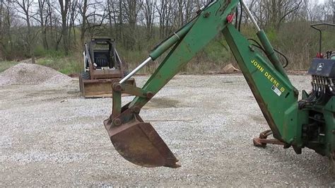 john deere backhoe attachment skid steer how to hook up|john deere 8b backhoe attachment.